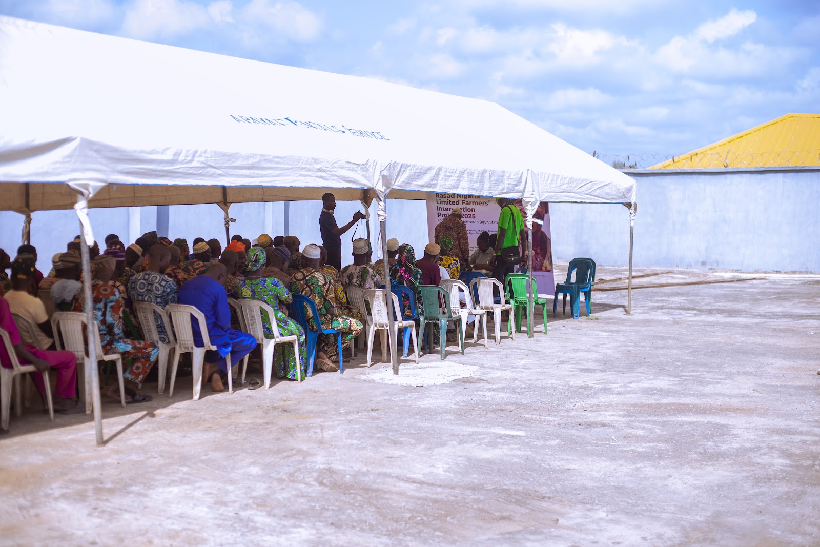 Rasad farmer intervention gathering beneath a marquee in Ogun State